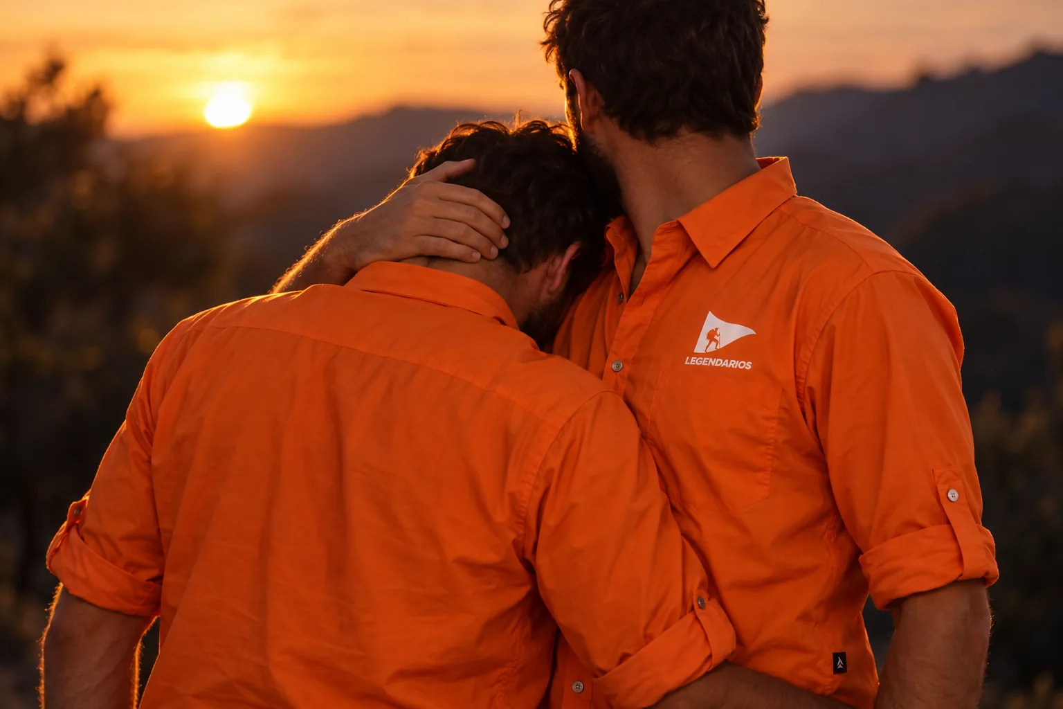 Two men in the farda embracing at dusk, one consoling the other. (illustration)